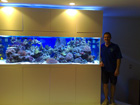 Trent and newly setup reef system under moonlight